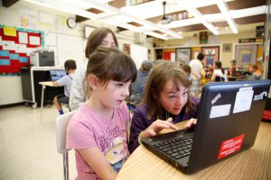 STEM Summer School students explore coding.