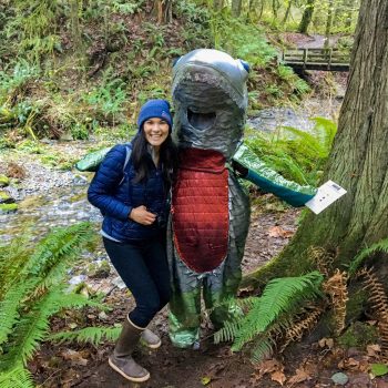 Megan poses with someone in a salmon costume